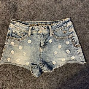 jean shorts with flowers on the front